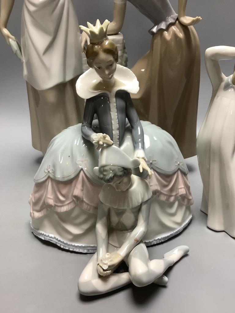 Four Nao figures and a Lladro group